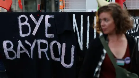 Political Turmoil in France: Prime Minister Ousted After Confidence Vote