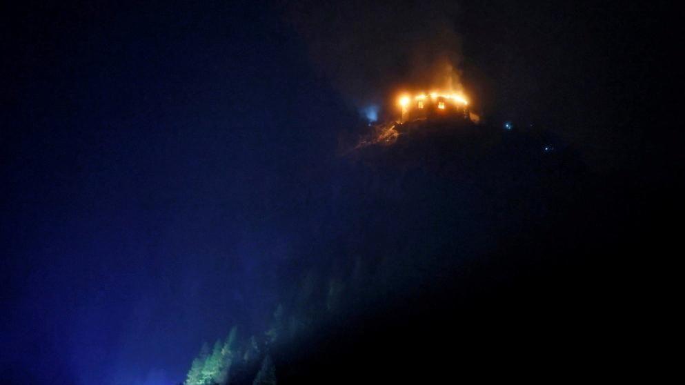 The Eagle's Nest on fire in the dark