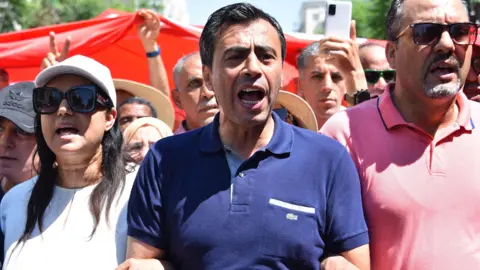 Dozens of Tunisian Opposition Figures Sentenced Amid Crackdown