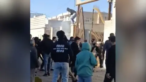 Escalating Unrest in Iran: Protesters Attempt to Storm Government Building