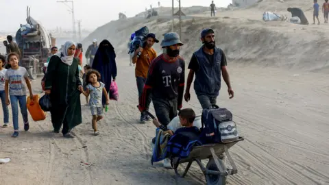 Humanitarian Crisis Deepens as Thousands Flee Gaza City Amid Israeli Offensive