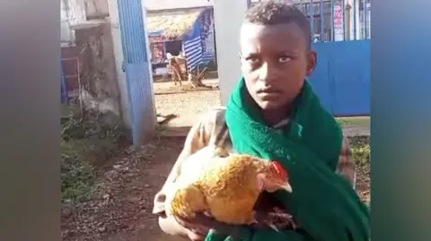 12‑Year‑Old Ethiopian Boy Wins Hearts after Taking Sick Chicken to Hospital