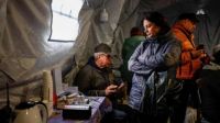 The city of Chernihiv in Ukraine is left in total blackout after a significant assault involving missiles and drones, causing widespread destruction and casualties, as the conflict intensifies.
