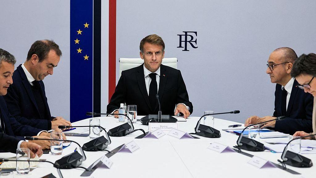 Macron at an inter‑ministerial crisis meeting at the Élysée Palace