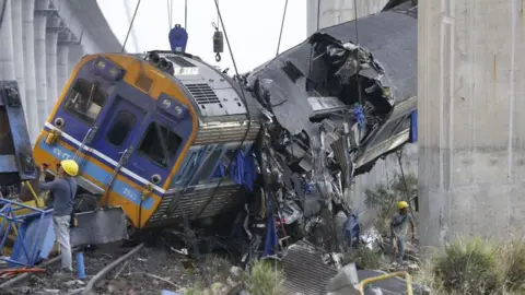 Tragedy Strikes as Crane Collapses on Thai Train, Claims 32 Lives