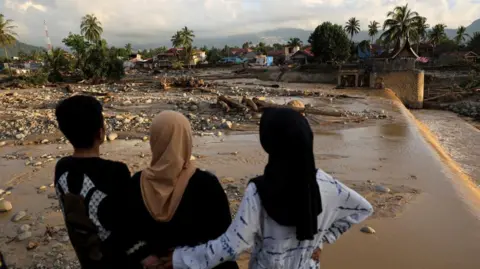 Humanitarian Crisis in Indonesia: Hundreds Missing as Floods Devastate Regions