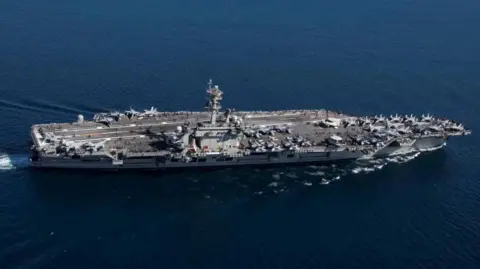 US Military Neutralizes Iranian Drone Threat Near Aircraft Carrier