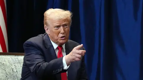 Trump Downplays War Threat with Venezuela Amid Ongoing Strikes