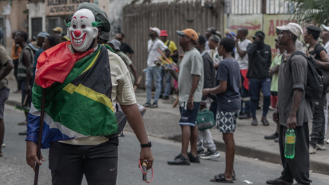 Man on street amid protest