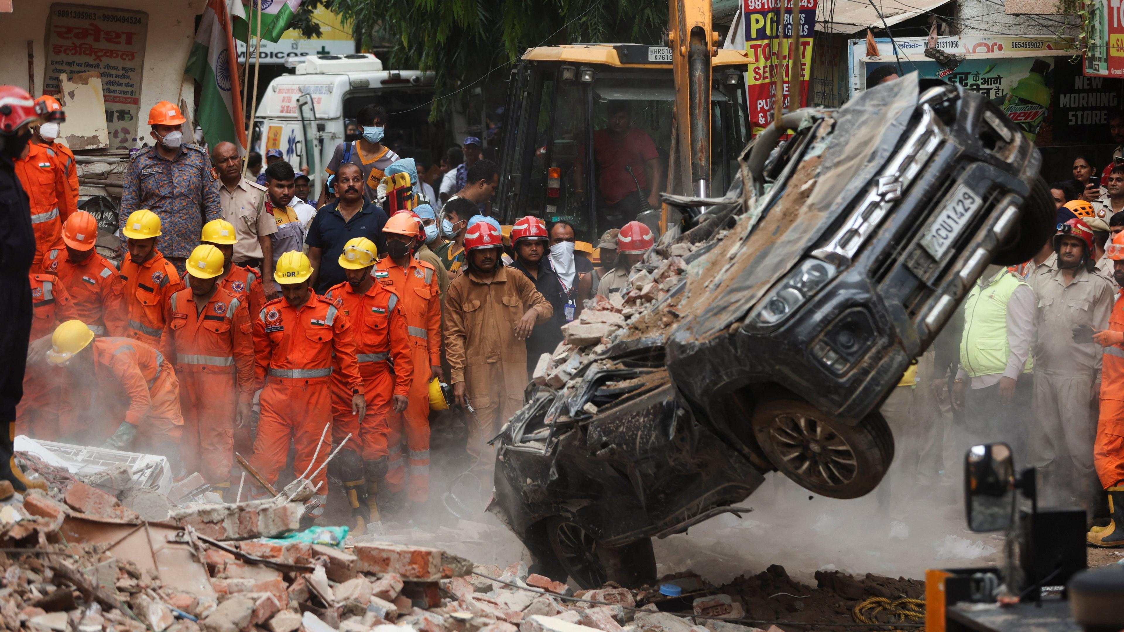 Dozens Trapped as Delhi Building Collapses Amid Basement Excavation