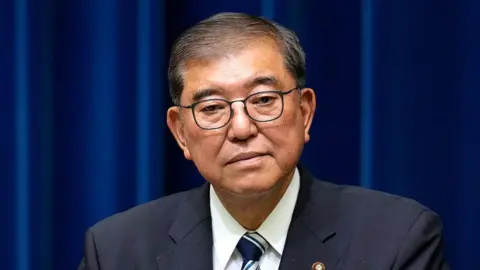 Japan Faces Leadership Crisis as PM Resigns Amidst Political Turmoil