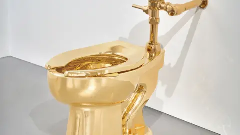 Ripley's Takes the Throne with $12M Golden Toilet Purchase