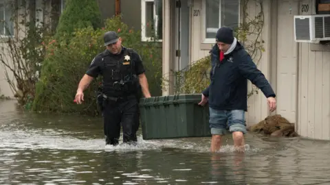 Severe Flooding Prompts Evacuations in Pacific Northwest